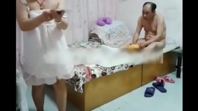Chinese Woman And Her Guy At The Hotel